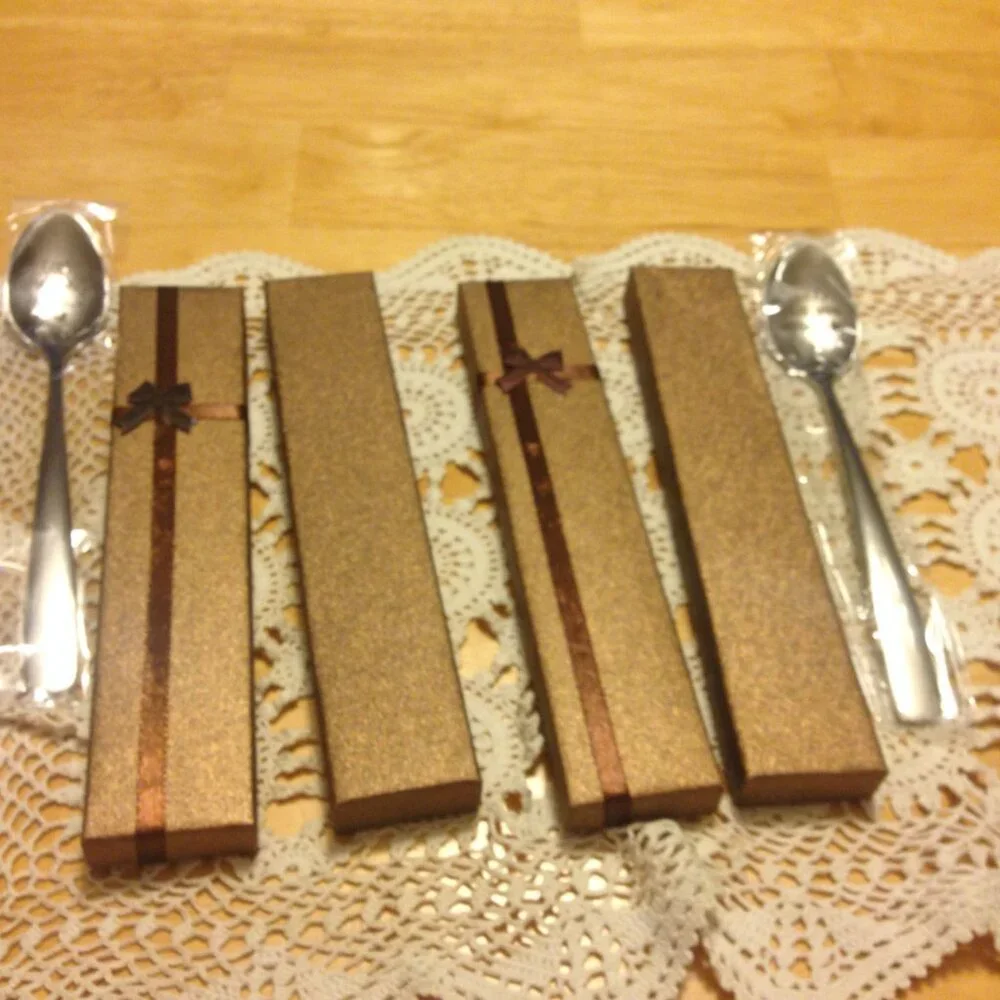 New inscribed stainless spoons in gift boxes